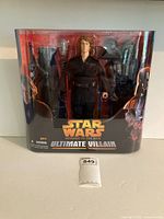Front of sealed Ultimate Villain box showing figure and accessories