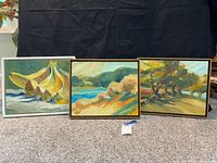 Front view showing all three framed paintings side by side