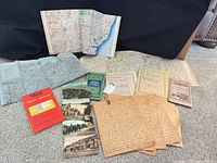 Overview of all maps, postcards and letters laid out