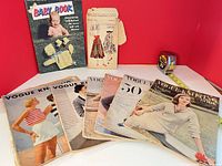 Group shot of all eight publications arranged on table