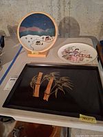 Overview of bowl, porcelain plate and tray on table
