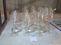 Full group of stemware showing both tall goblets and short snifters