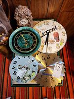 Group shot of five clocks on small table