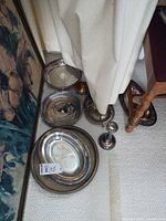 Group view of trays, platter, candlestick and creamer