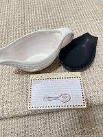 gravy boat, spoon rest, sealed recipe cards grouped