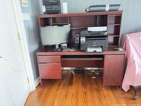 Front view of desk showing hutch, monitor, printer and overall design
