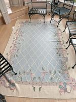 Full view of wool area rug showing overall design and size