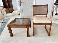 Chair and end table side by side to show overall design and proportion