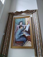 Full view of framed painting hanging on wall
