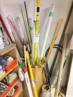 Overall view of mixed poles, tubes, hose, insulators and cardboard rolls