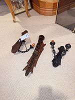 All three sconces laid out showing overall design and materials