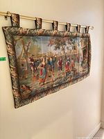 Full view of woven pastoral tapestry with rod and tab top loops