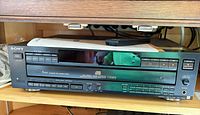 Front view of Sony CDP-C69ES player in shelf