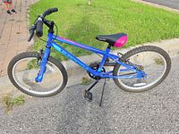 Full side view of blue/pink Supercycle kids bike with 20-inch wheels