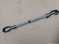 Full view of Thule adapter bar fully extended showing overall condition