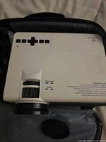 Top view of Vankyo projector inside case