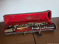 Full set of clarinet joints, mouthpiece, reeds and case interior