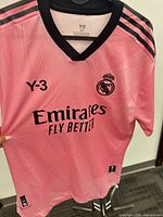 Front view showing color, sponsor, Y-3 branding, club crest