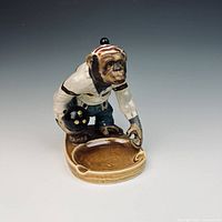 Front view of ceramic monkey ashtray
