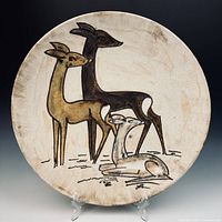 Front view of round Ruscha platter showing deer motif and full design