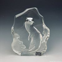 Front view of signed crystal otter plaque