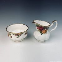 Creamer and sugar bowl front view