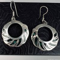 Front view of both earrings showing design and inlay