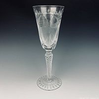 Full view of crystal toasting glass showing shape and stem