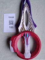 Front view of Bandai Ultraman Trigger DX Circle Arms toy showing full blade, circular guard, colour scheme and detailing