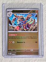 Front view of sleeved Barbaracle holo gold card