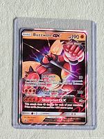 Front of Buzzwole GX card in toploader
