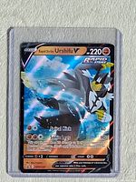 Front of Urshifu V Battle Styles holo foil card in protective sleeve