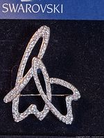 Front view of Swarovski crystal brooch on card