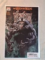 Front view of Venom #14 variant comic sealed in bag