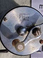Side plate showing Bronson Flyer No. 2450 stamp and handle assembly