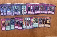 Overview of all sleeved Yu-Gi-Oh! cards laid out on table
