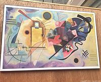 Front view of framed abstract geometric print showing full artwork and frame