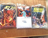 Front view of all three bagged comics