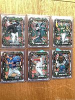 Overview of all six Topps Holiday baseball insert cards in holders