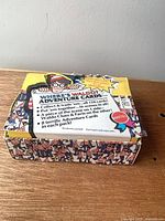 Closed display box top showing product information and graphics
