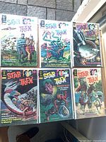 Group shot of six bagged Gold Key Star Trek comics