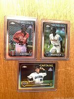All three Topps Chrome Pro Debut foil cards in toploaders