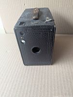 Front view showing lens and viewfinders