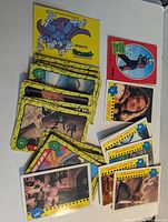 Spread of TMNT Topps 1989 trading cards showing fronts and backs