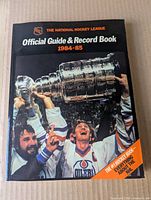 Front cover showing title, season, and Wayne Gretzky with Stanley Cup