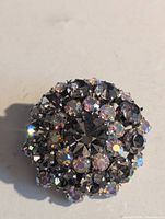 Front view showing circular cluster of rhinestones