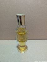 Front view of Avon toy soldier cologne bottle showing fill level