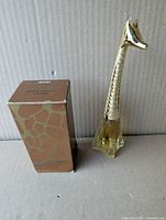 Perfume bottle and box front view