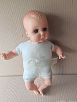 Front view of cloth-bodied baby doll