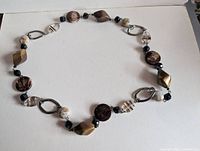Full view of beaded necklace laid flat